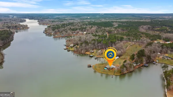 a view of a swimming pool with a balcony