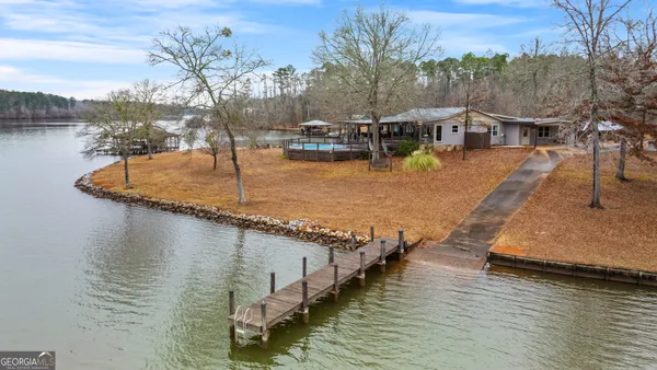a kitchen with stainless steel appliances a sink and a refrigerator