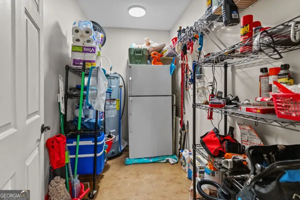 a bedroom with a bed and dresser