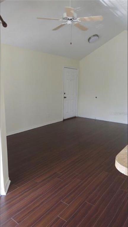 1083 South Hiawassee Road, Unit 635 Orlando, FL 32835 - Photo 5 of 16 wooden floor in an empty room