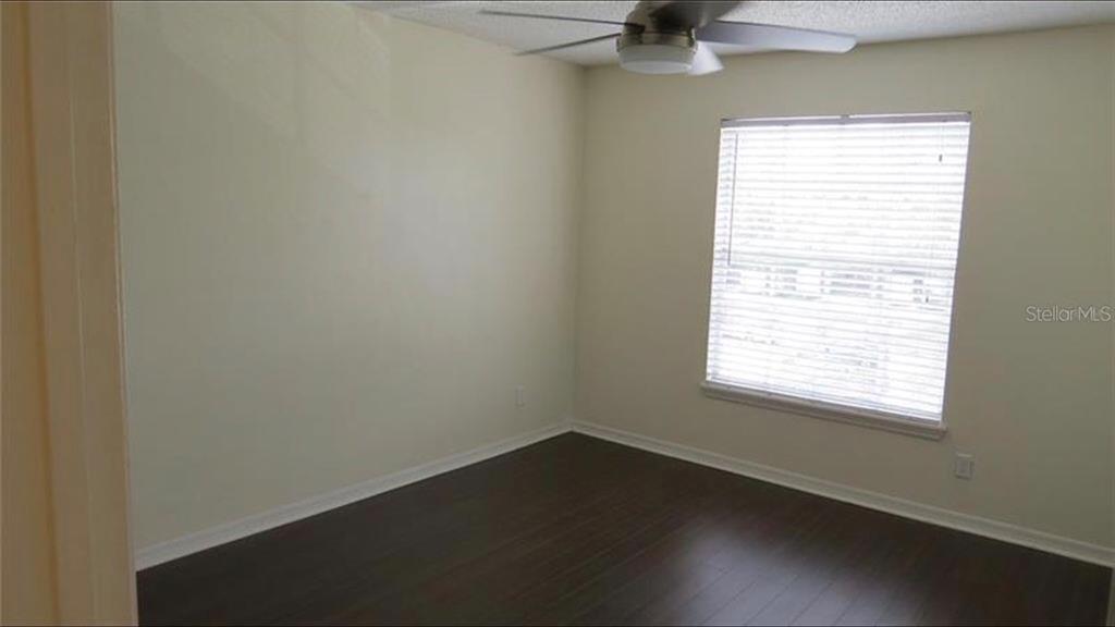 1083 South Hiawassee Road, Unit 635 Orlando, FL 32835 - Photo 9 of 16 an empty room with a window
