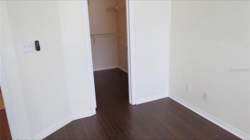 1083 South Hiawassee Road, Unit 635 Orlando, FL 32835 - Photo 10 of 16 a view of a hallway with wooden floor