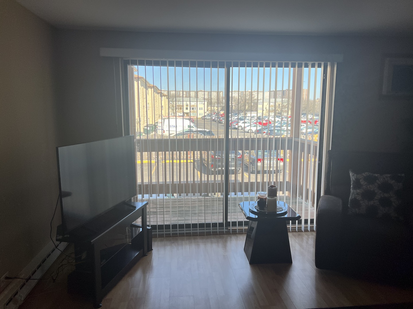 5117 North East River Road, Unit 2A Chicago, IL 60656 - Photo 12 of 32 a view of empty room with wooden floor and fan