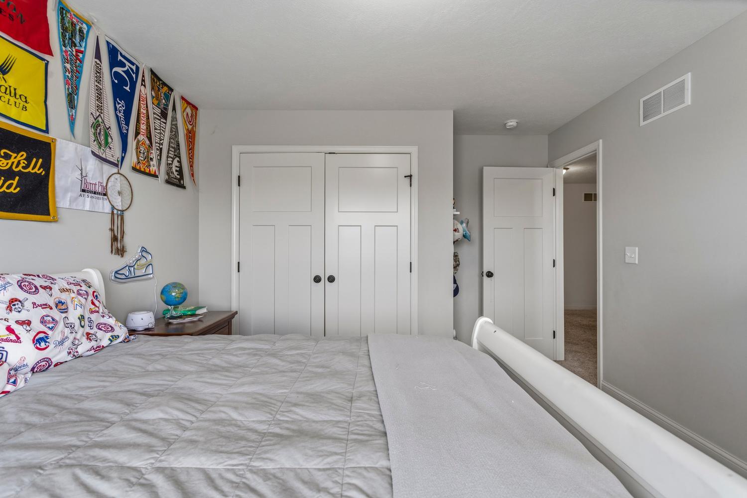 718 Cole Lane Mahomet, IL 61853 - Photo 31 of 44 a bedroom with bed and furniture