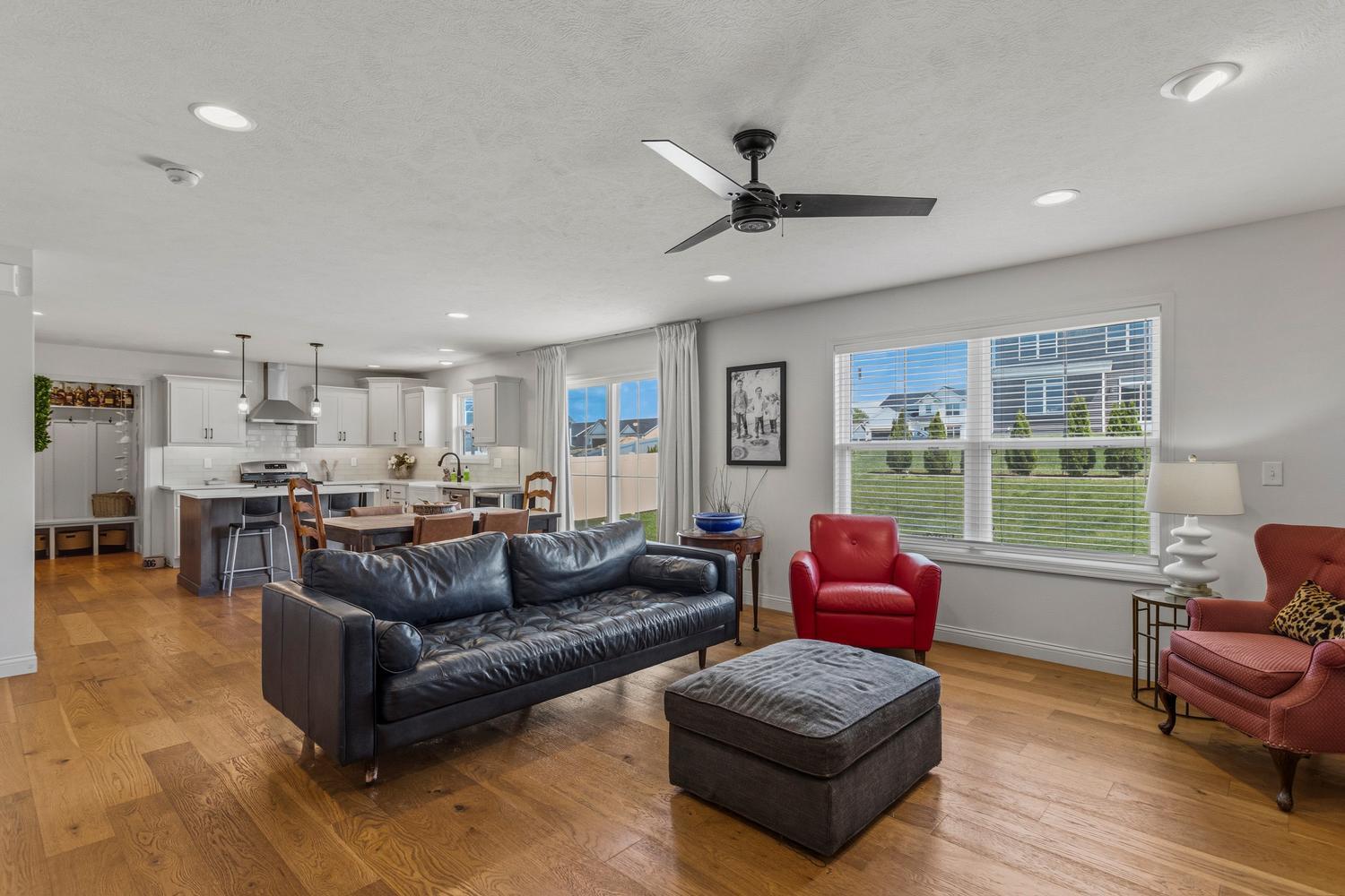 718 Cole Lane Mahomet, IL 61853 - Photo 10 of 44 a living room with furniture and a large window