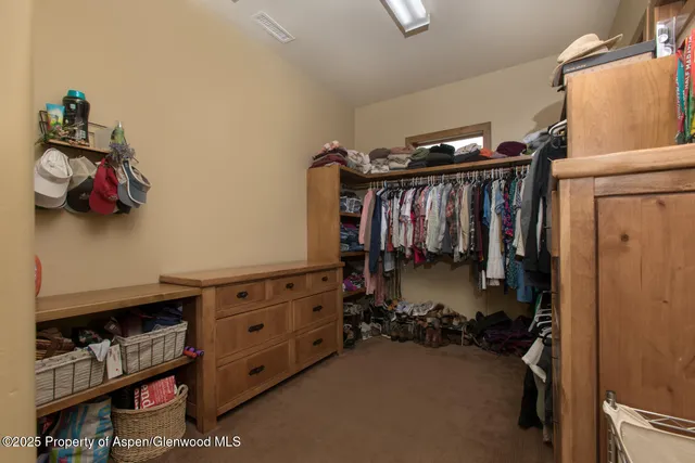 a utility room with sink dryer and washer