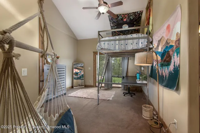 a living room with furniture a air conditioner vent and a window