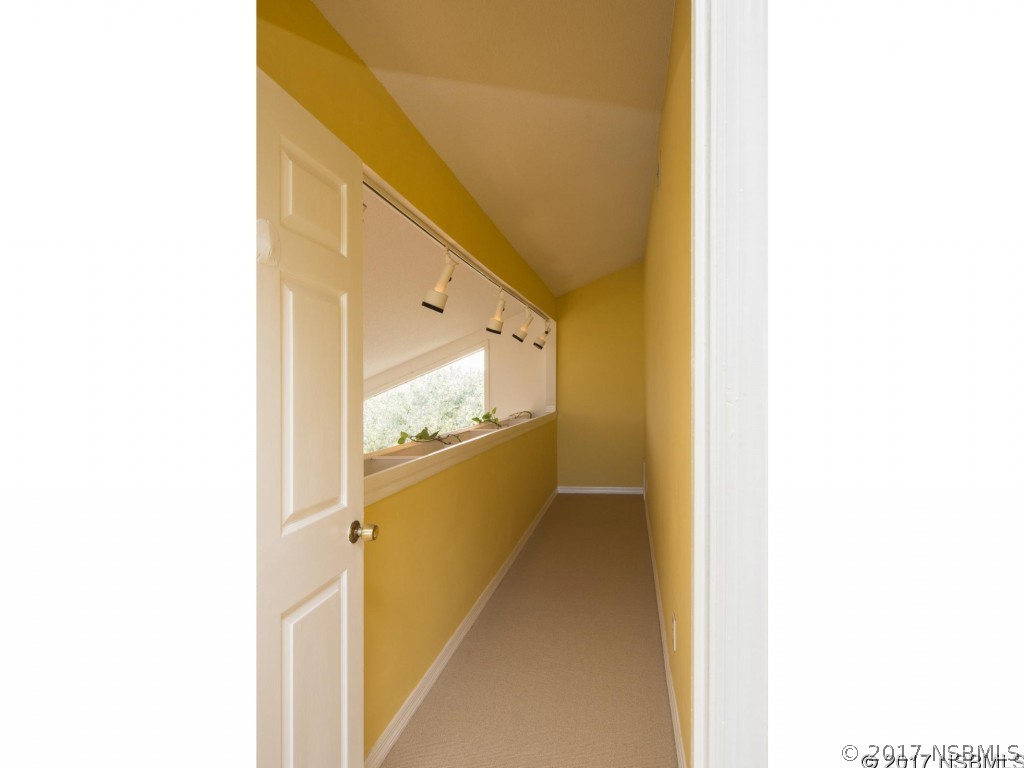 6455 Engram Road New Smyrna Beach, FL 32169 - Photo 20 of 33 a view of a hallway
