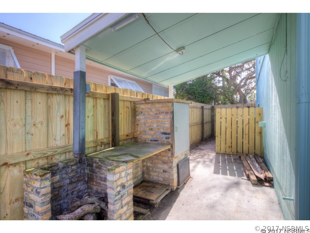 6455 Engram Road New Smyrna Beach, FL 32169 - Photo 33 of 33 a house view with a backyard space