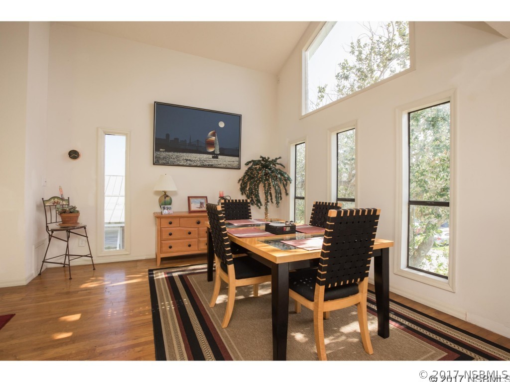 6455 Engram Road New Smyrna Beach, FL 32169 - Photo 6 of 33 a workspace with furniture and window