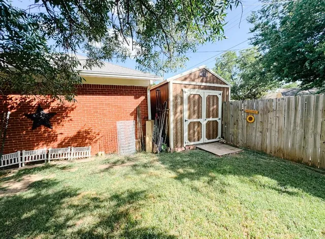 a view of a back yard of the house