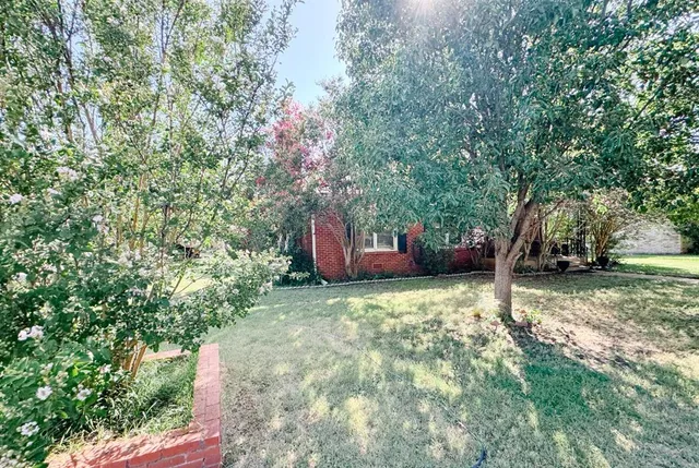 a fire hydrant in the middle of a field