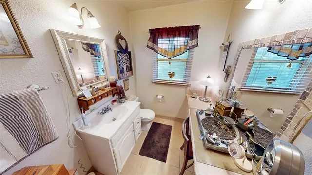 a view of living room with furniture and a window