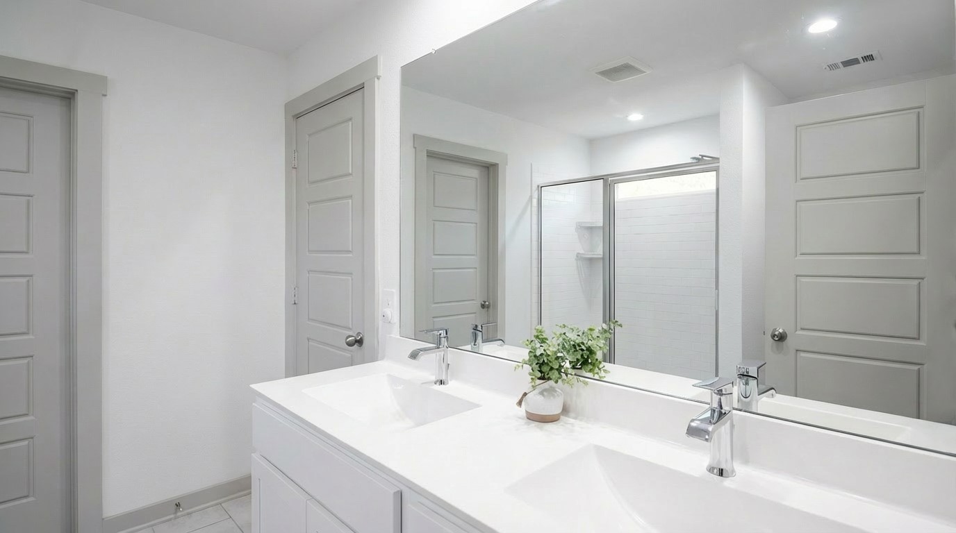 12918 Wempe Way Houston, TX 77047 - Photo 11 of 18 a bathroom with a sink and a mirror