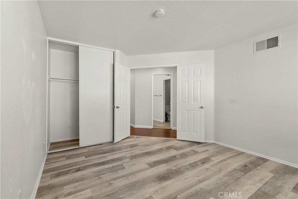 2136 East Colunga Street Colton, CA 92324 - Photo 28 of 40 a view of a livingroom with wooden floor