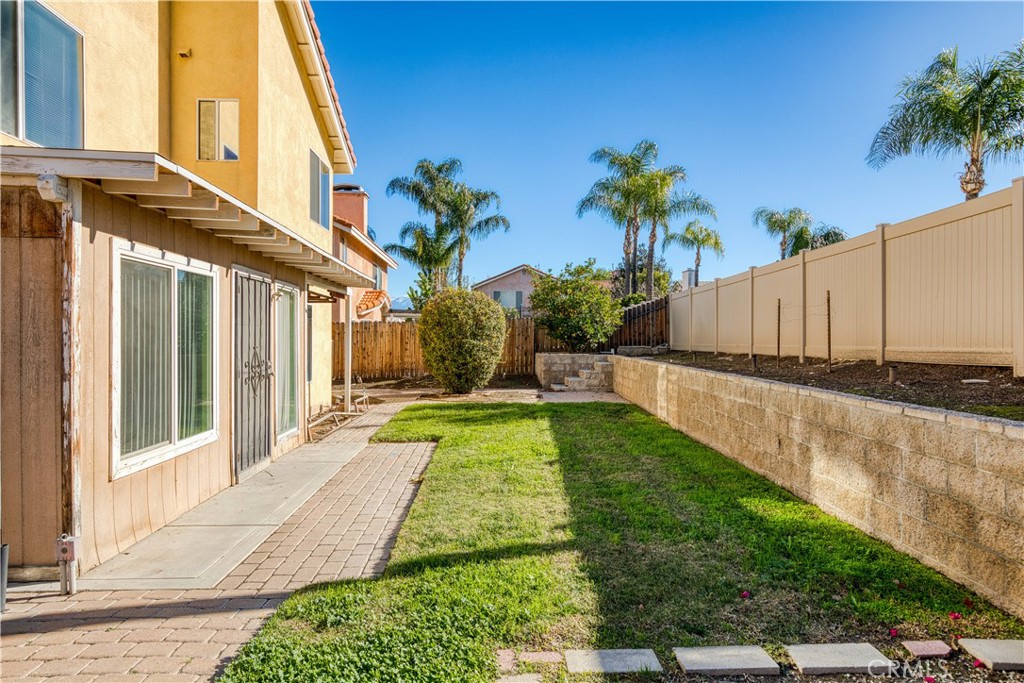 2136 East Colunga Street Colton, CA 92324 - Photo 36 of 40 a view of a backyard with potted plants