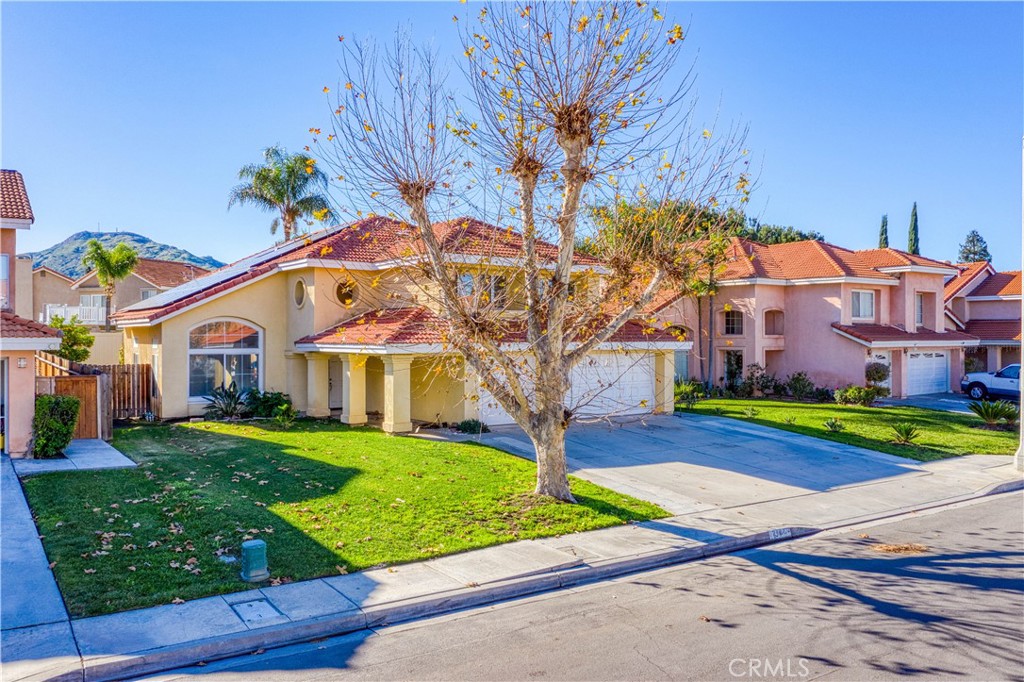 2136 East Colunga Street Colton, CA 92324 - Photo 4 of 40 a front view of house with yard and green space