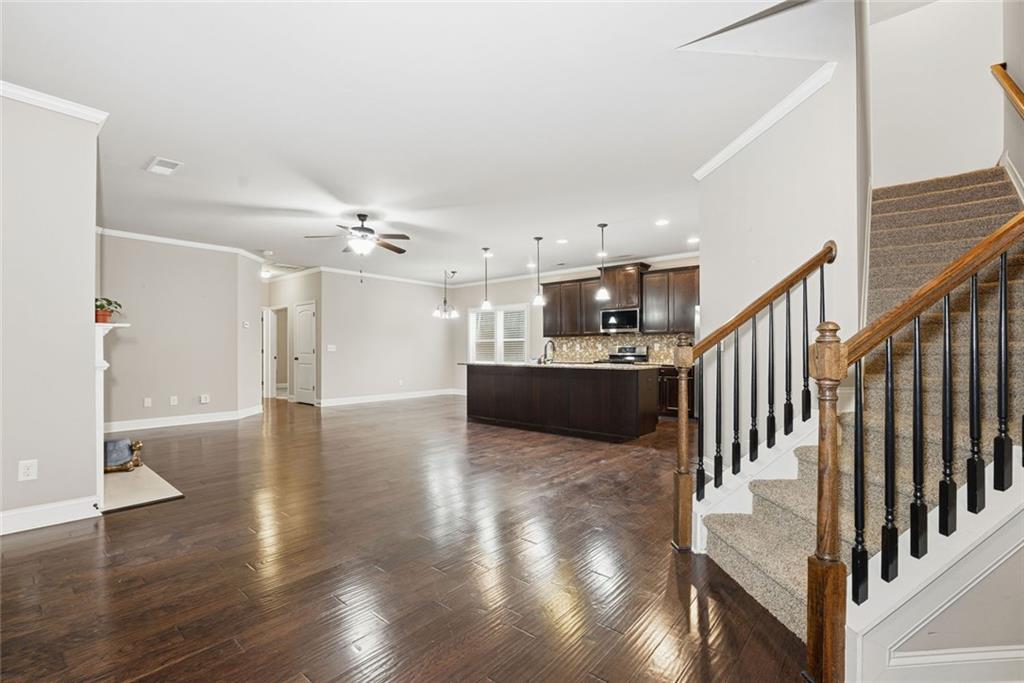 163 Hawthorne Ridge Circle Dallas, GA 30132 - Photo 12 of 50 a view of kitchen with furniture and wooden floor