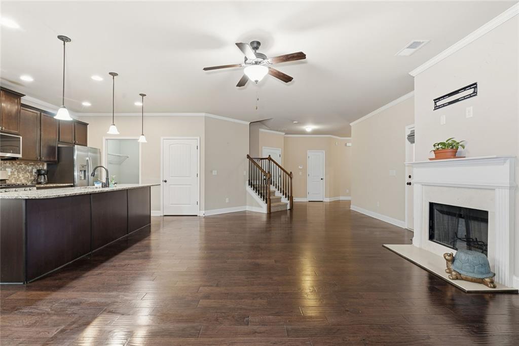 163 Hawthorne Ridge Circle Dallas, GA 30132 - Photo 16 of 50 a view of a kitchen with cabinets and wooden floor