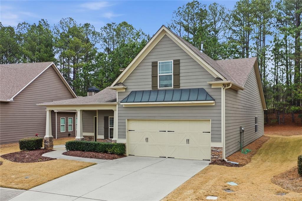 163 Hawthorne Ridge Circle Dallas, GA 30132 - Photo 2 of 50 a view of a house with a yard