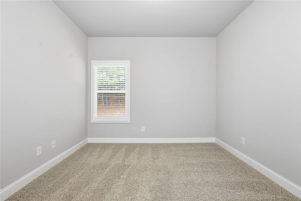 163 Hawthorne Ridge Circle Dallas, GA 30132 - Photo 25 of 50 an empty room with a window