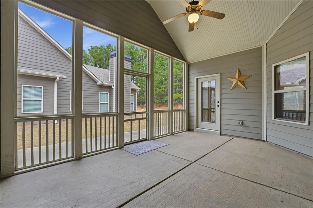 163 Hawthorne Ridge Circle Dallas, GA 30132 - Photo 39 of 50 a view of a livingroom with a ceiling fan and window
