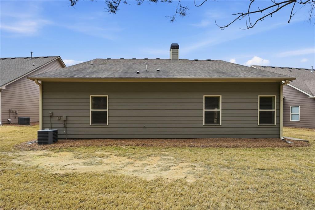 163 Hawthorne Ridge Circle Dallas, GA 30132 - Photo 41 of 50 a house view with a backyard space