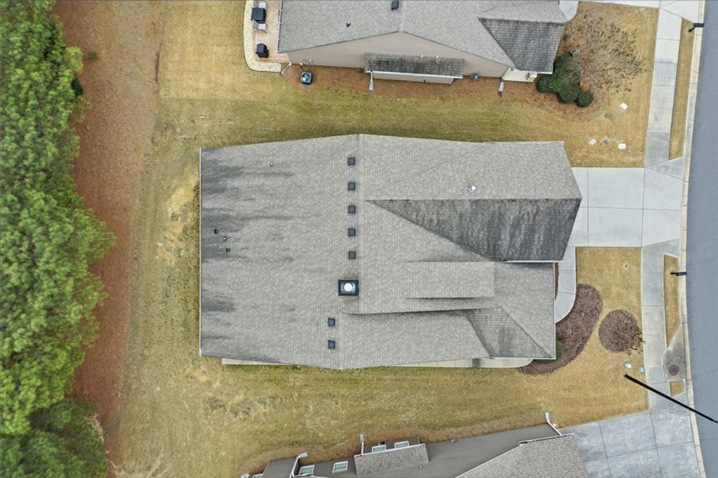 163 Hawthorne Ridge Circle Dallas, GA 30132 - Photo 44 of 50 an aerial view of a house with a swimming pool