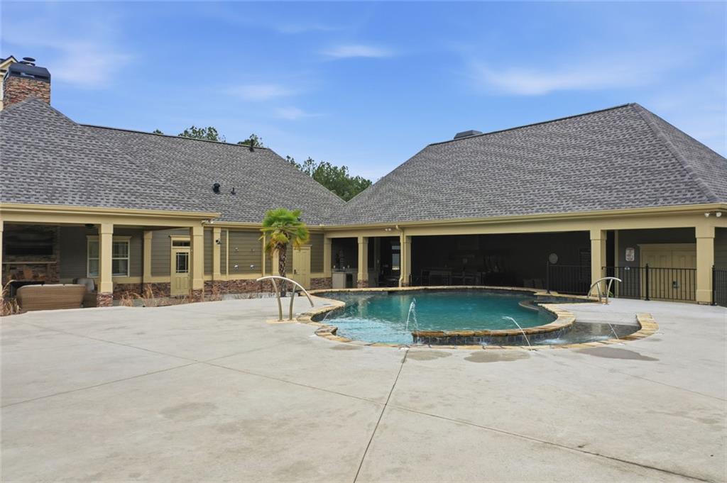 163 Hawthorne Ridge Circle Dallas, GA 30132 - Photo 46 of 50 a backyard of a house with yard and barbeque oven