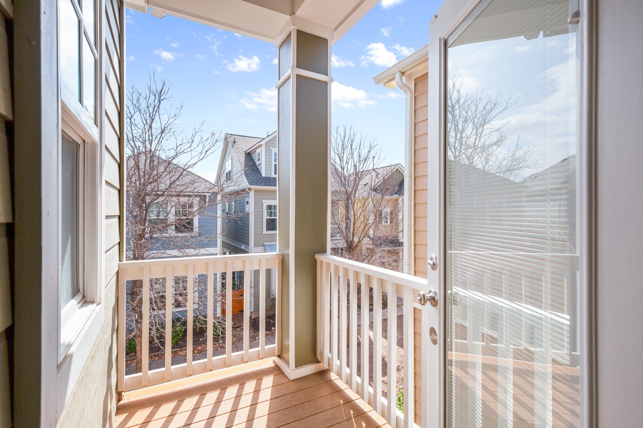 4644 Page Street Austin, TX 78723 - Photo 11 of 21 a view of a brick house with a door and wooden floor