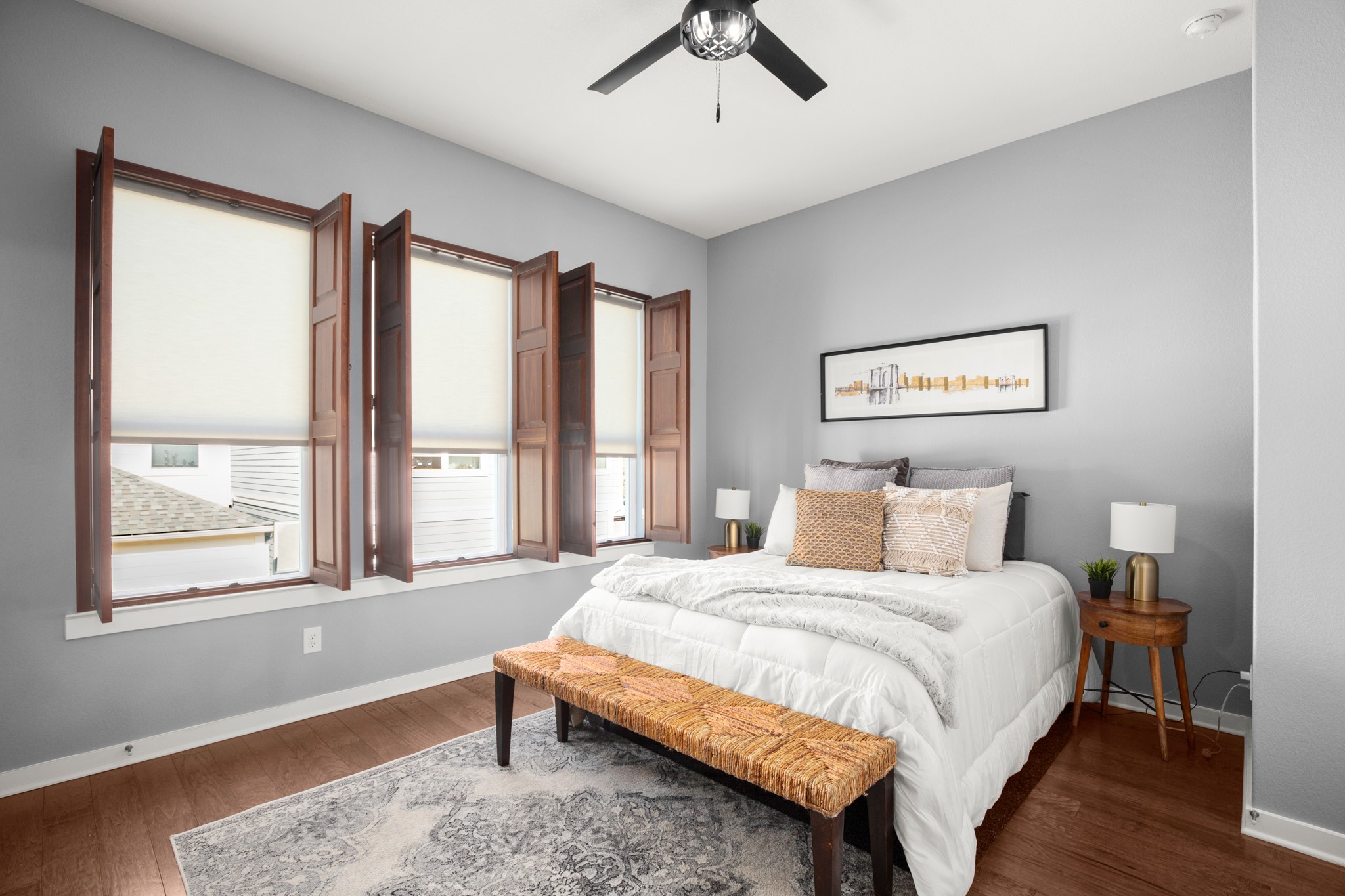 4644 Page Street Austin, TX 78723 - Photo 13 of 21 a bedroom with a bed and a large window