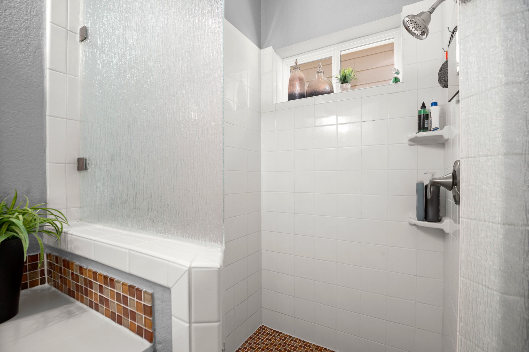 4644 Page Street Austin, TX 78723 - Photo 15 of 21 a bathroom with a bathtub and shower