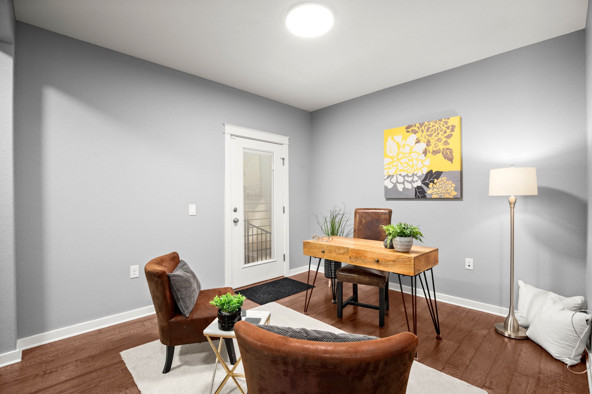 4644 Page Street Austin, TX 78723 - Photo 17 of 21 a workspace room with furniture and wooden floor
