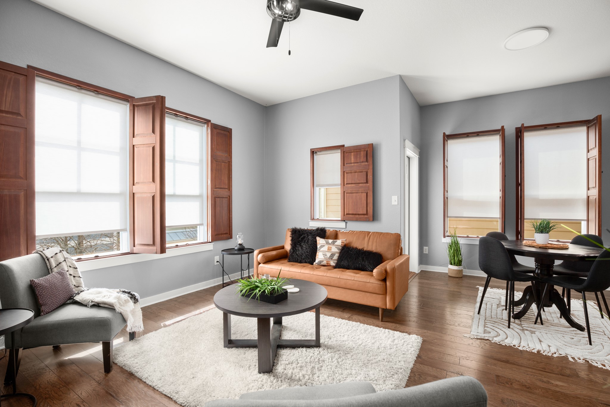 4644 Page Street Austin, TX 78723 - Photo 4 of 21 a living room with furniture and floor to ceiling windows