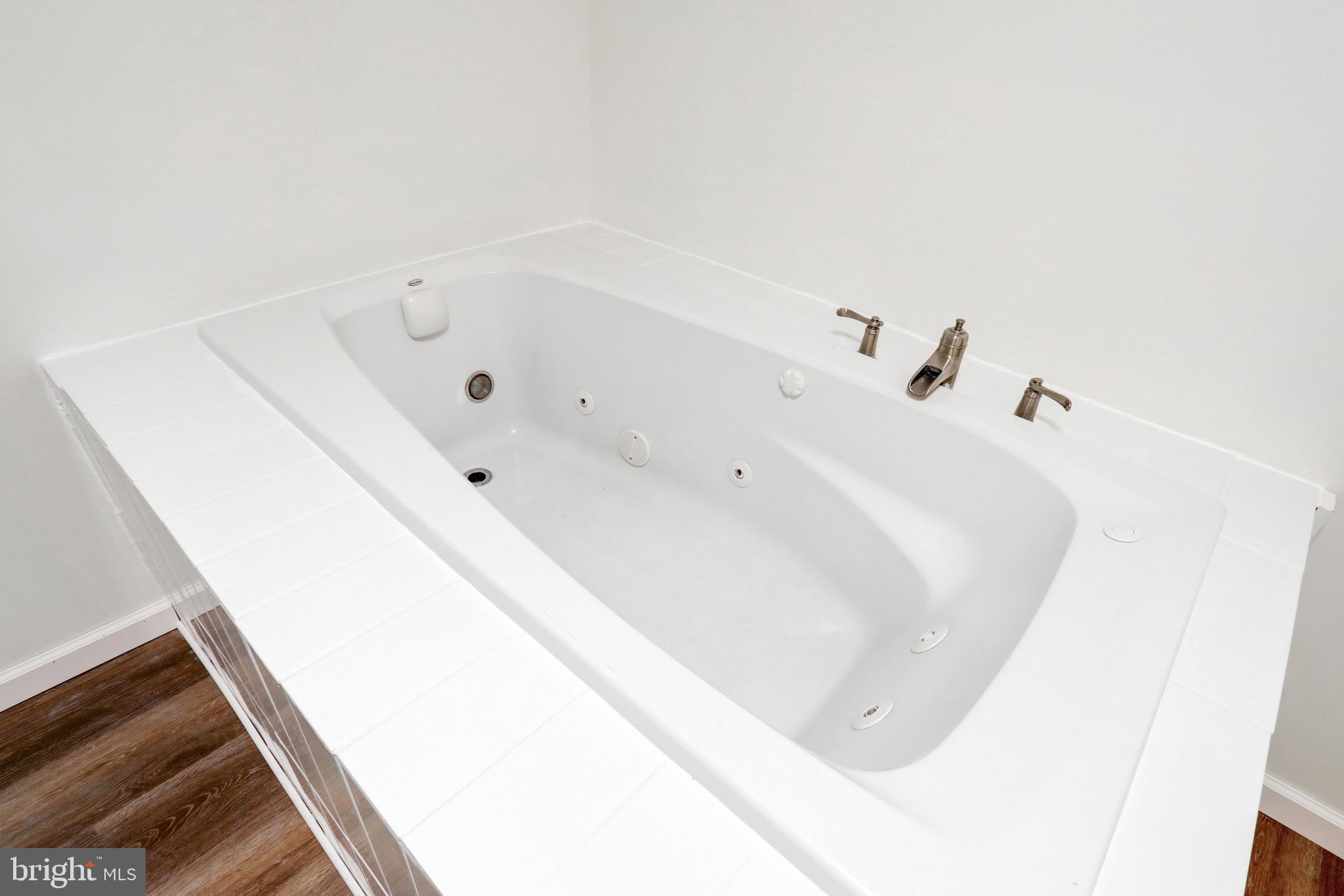 2145 Dunks Ferry Road Bensalem, PA 19020 - Photo 17 of 37 a bathroom with a bathtub