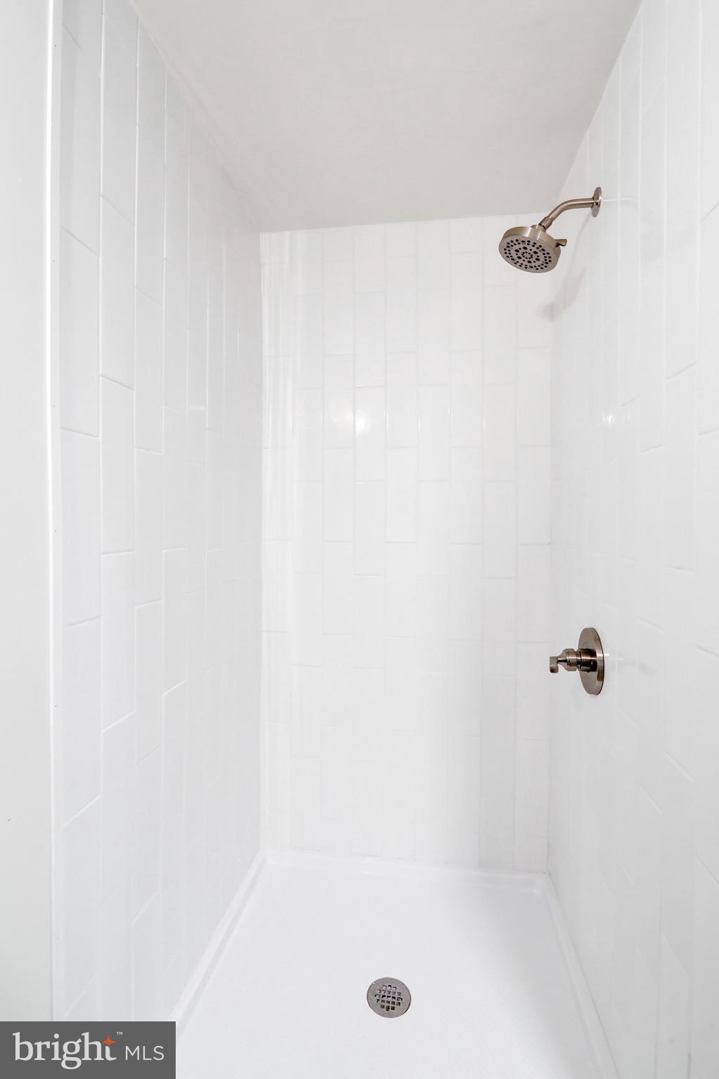 2145 Dunks Ferry Road Bensalem, PA 19020 - Photo 18 of 37 a bathroom with a shower