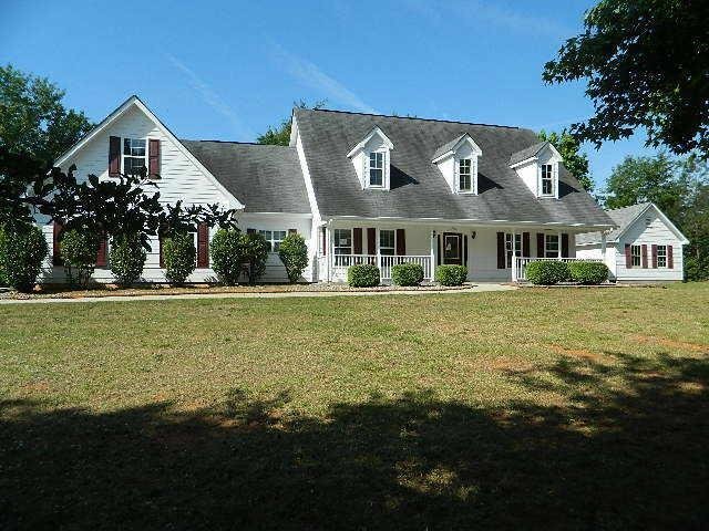 3900 Apalachee Ridge Monroe, GA 30656 - Photo 1 of 1 a front view of a house with garden