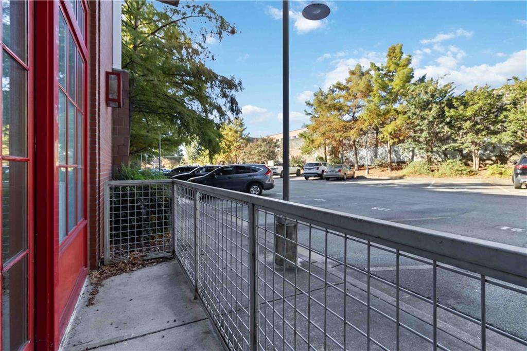 572 Edgewood Avenue Northeast, Unit 106 Atlanta, GA 30312 - Photo 10 of 17 a view of balcony with wooden floor