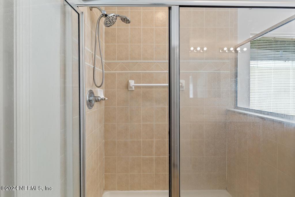 5902 Round Table Road Jacksonville, FL 32254 - Photo 37 of 44 a bathroom with a shower