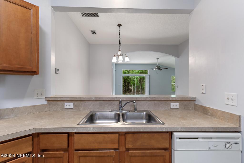 5902 Round Table Road Jacksonville, FL 32254 - Photo 8 of 44 a kitchen with a sink and cabinets