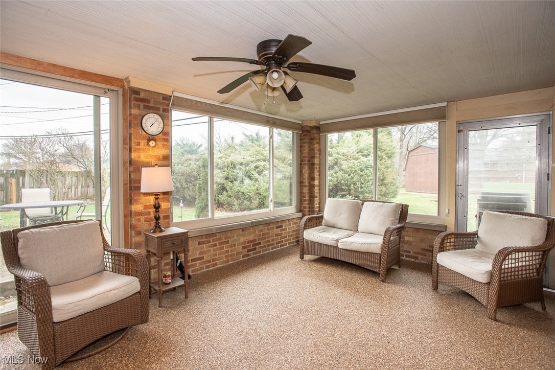13740 Old Pleasant Valley Road Cleveland, OH 44130 - Photo 12 of 28 Sunroom / solarium with a ceiling fan and an outdoor living space