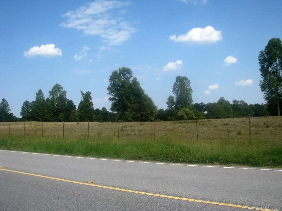 371 McFarland Road York, SC 29745 - Photo 3 of 8 a view of a golf course with a lake