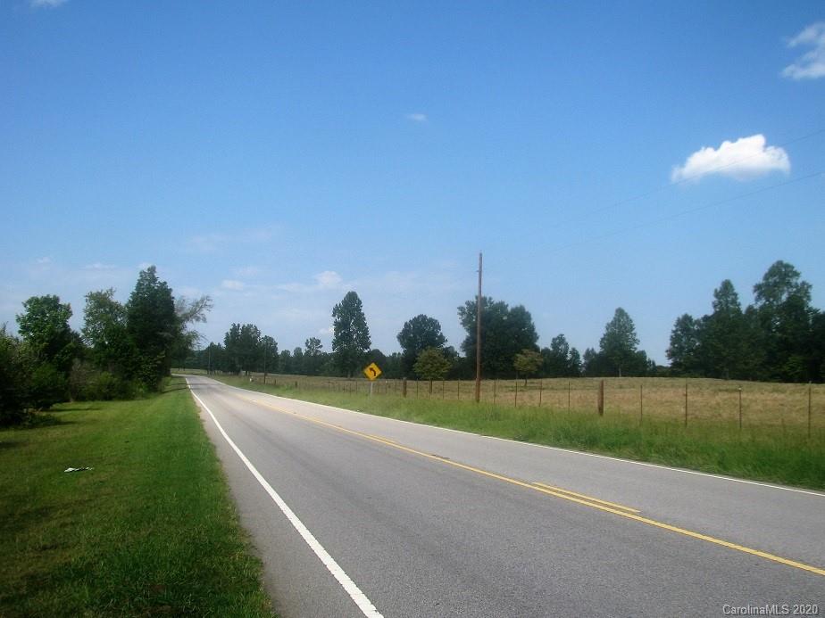 371 McFarland Road York, SC 29745 - Photo 5 of 8 a view of a golf course with a lake