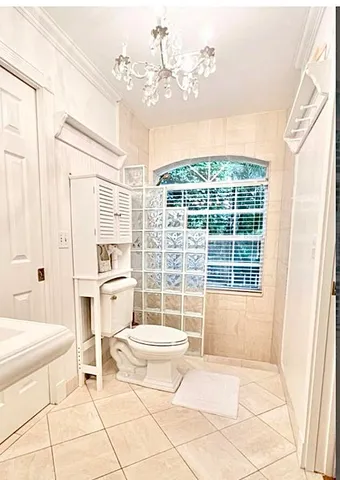 a bathroom with a toilet a sink and a bathtub