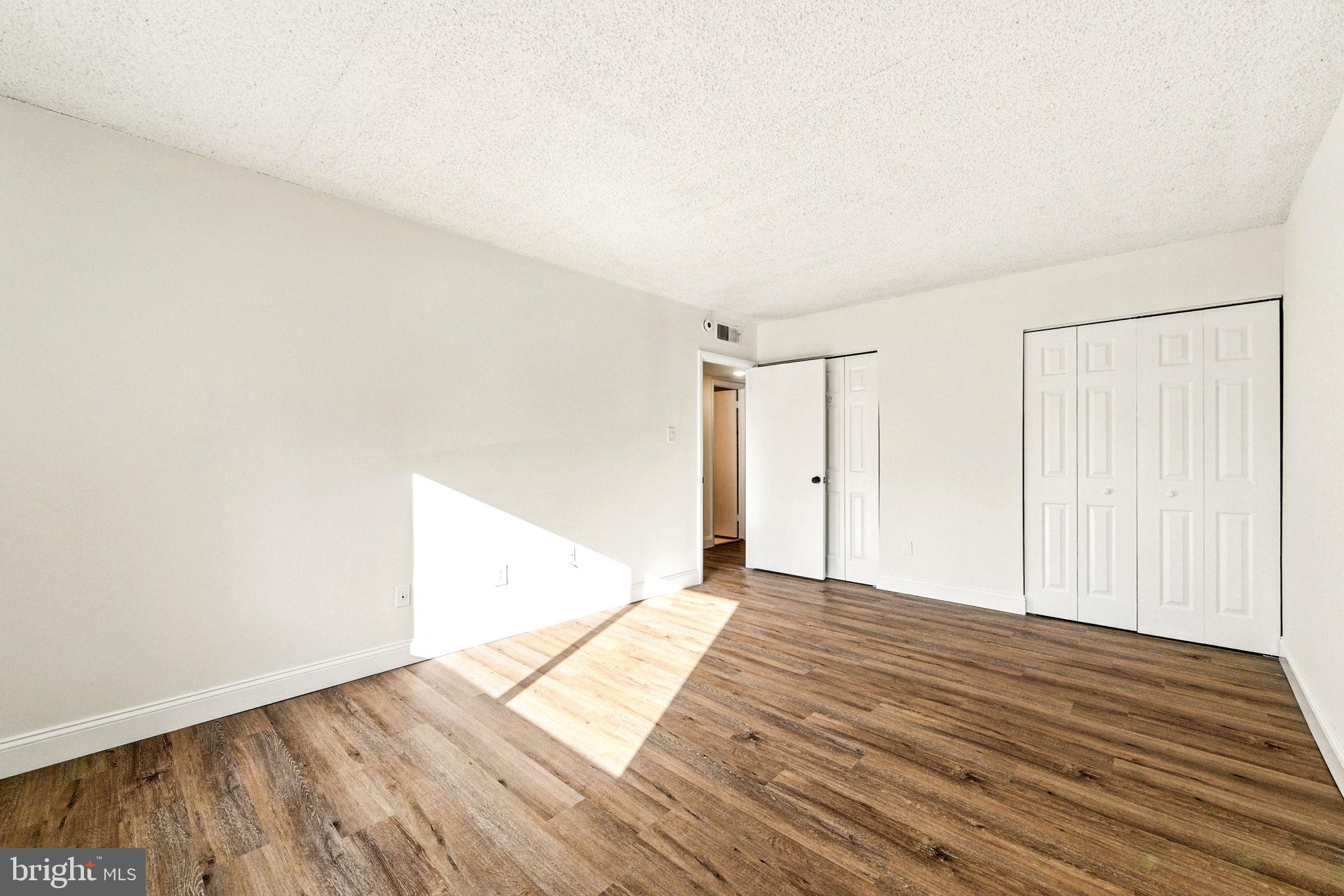338 Saybrook Lane Wallingford, PA 19086 - Photo 20 of 30 a view of an empty room and wooden floor