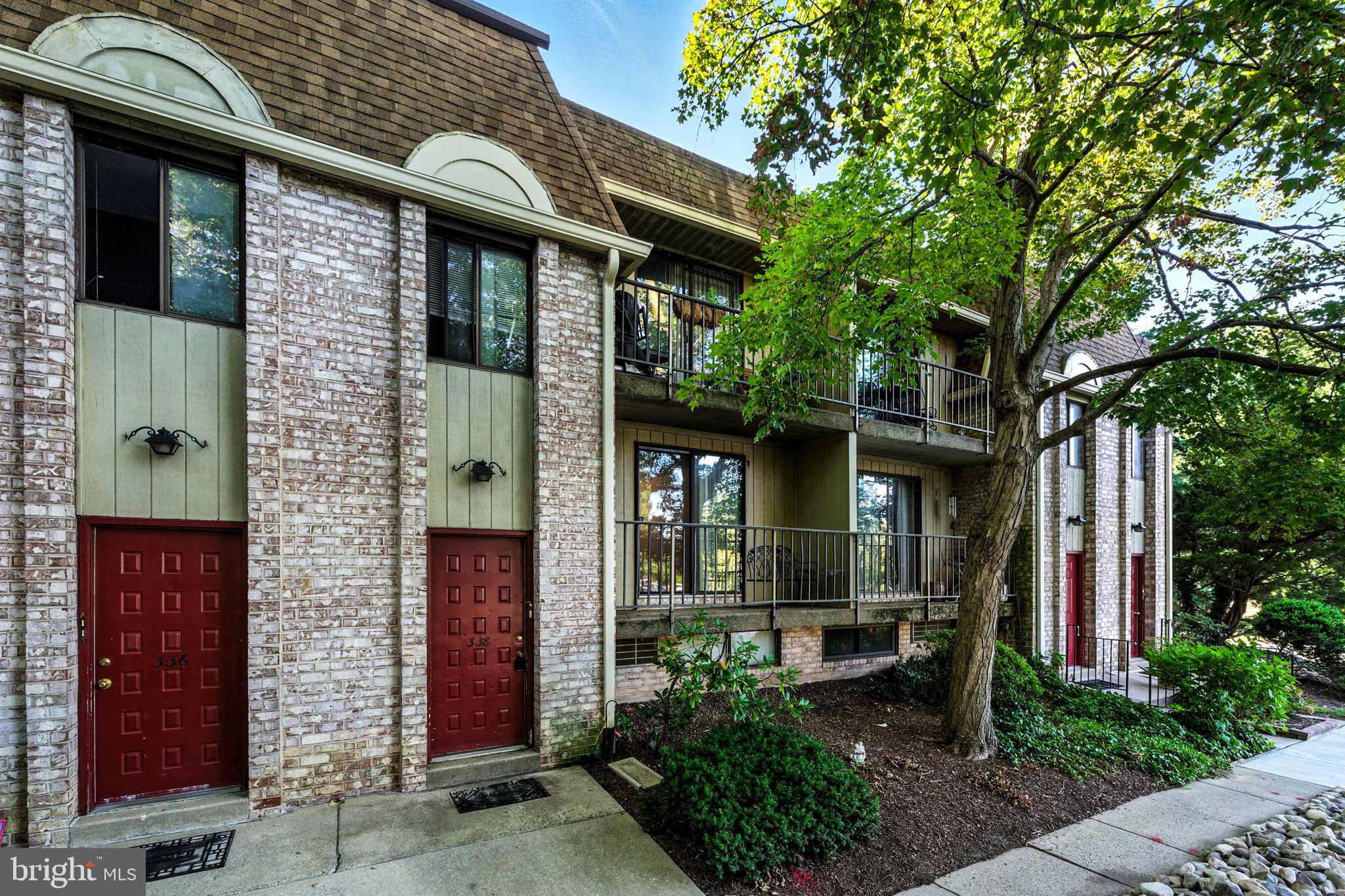 338 Saybrook Lane Wallingford, PA 19086 - Photo 2 of 30 a front view of a house with garden