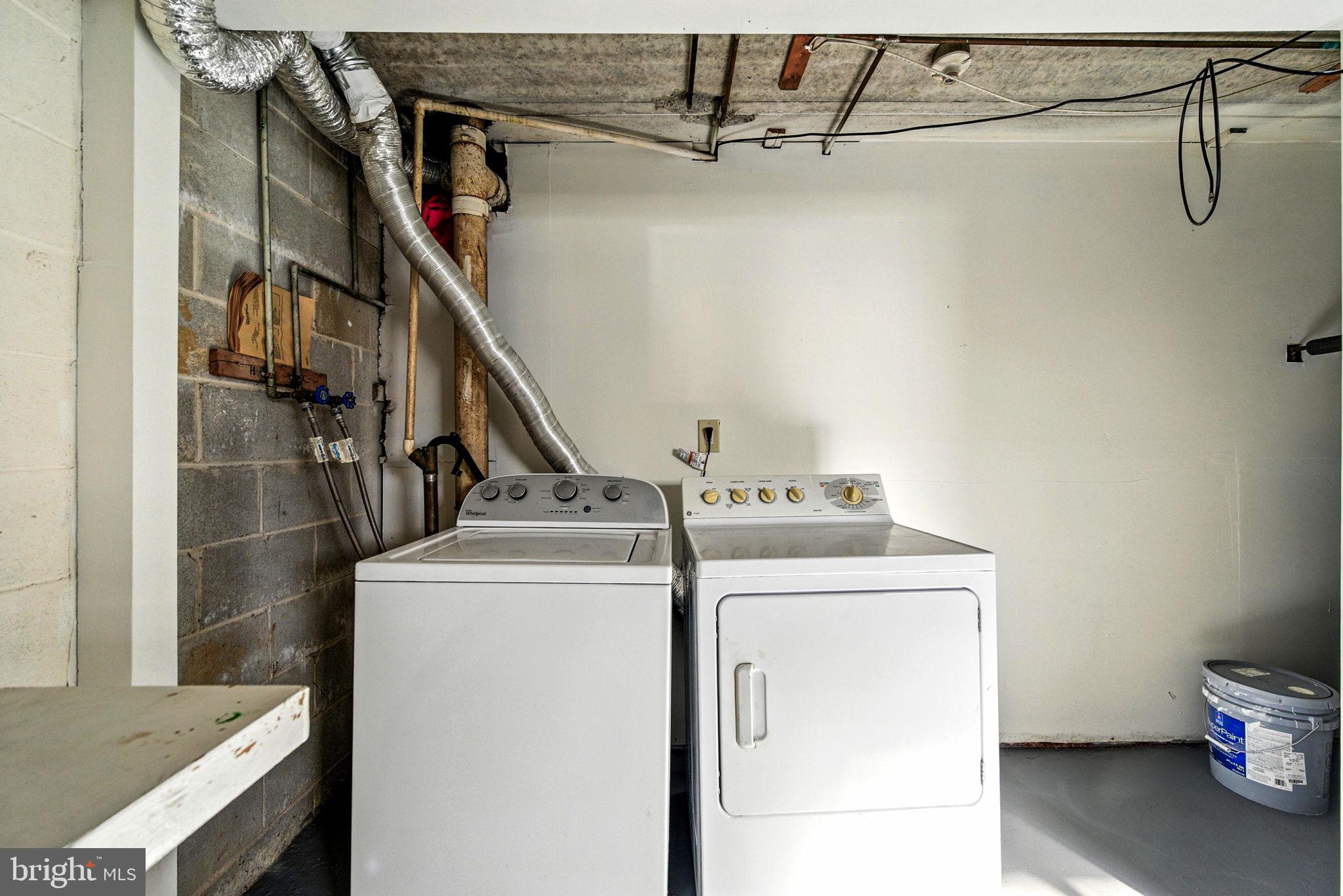 338 Saybrook Lane Wallingford, PA 19086 - Photo 25 of 30 a utility room with dryer and washer