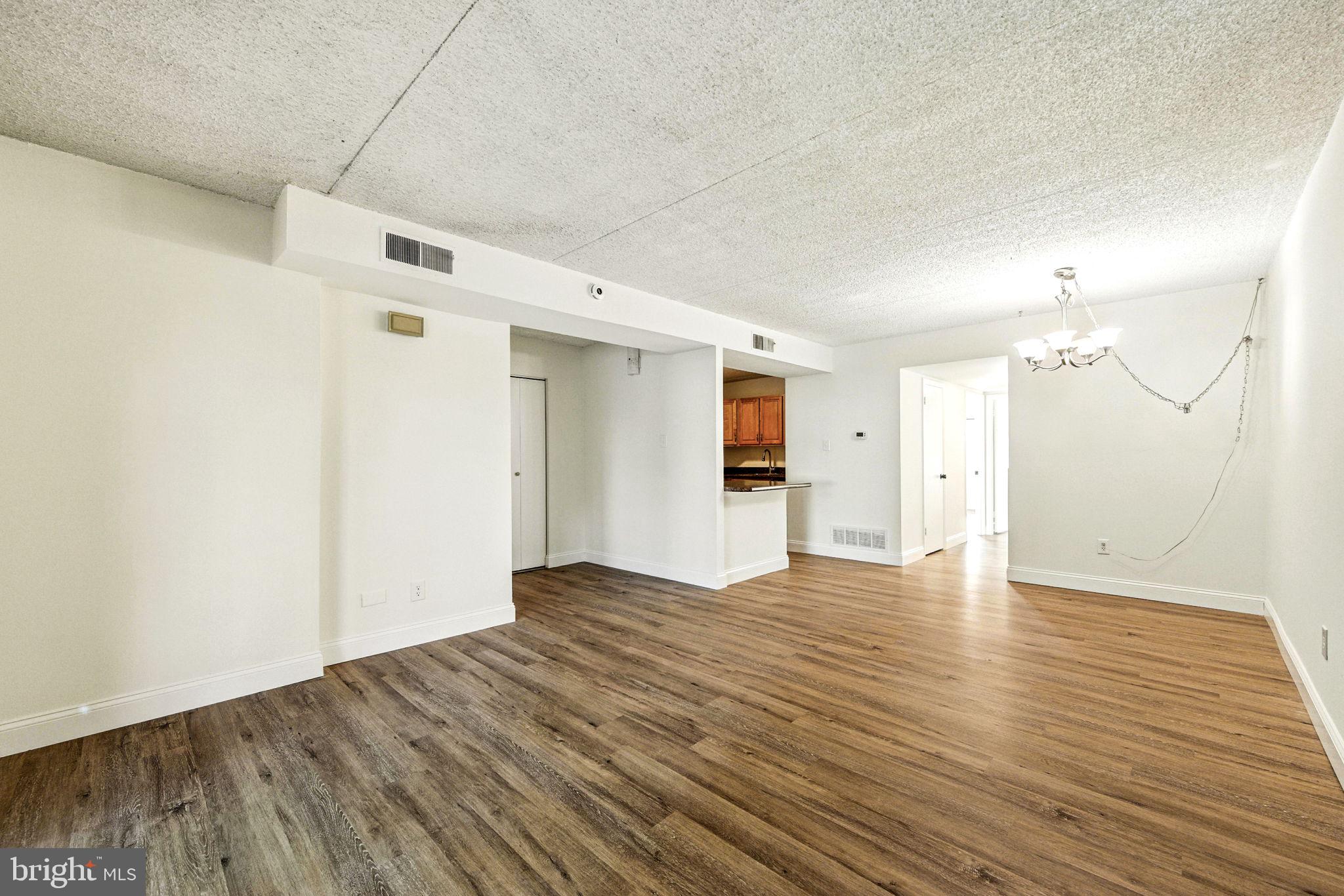 338 Saybrook Lane Wallingford, PA 19086 - Photo 7 of 30 a view of empty room with wooden floor