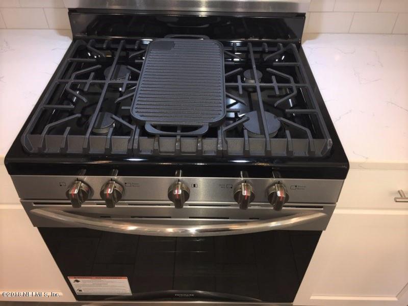 443 Deer Crossing Road St. Augustine, FL 32086 - Photo 12 of 47 GAS STOVETOP CLOSEUP
