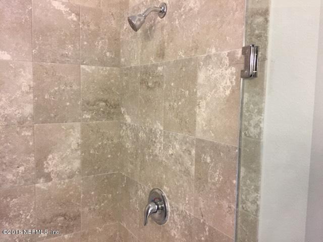 443 Deer Crossing Road St. Augustine, FL 32086 - Photo 14 of 47 CLOSE UP OF MASTER SHOWER TILE
